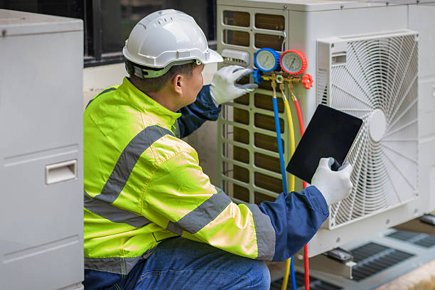 Professional Hvac Installation technician working in Camp Hill, AL